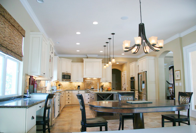 Kitchen chandelier and pendant lighting installation in a Calgary home